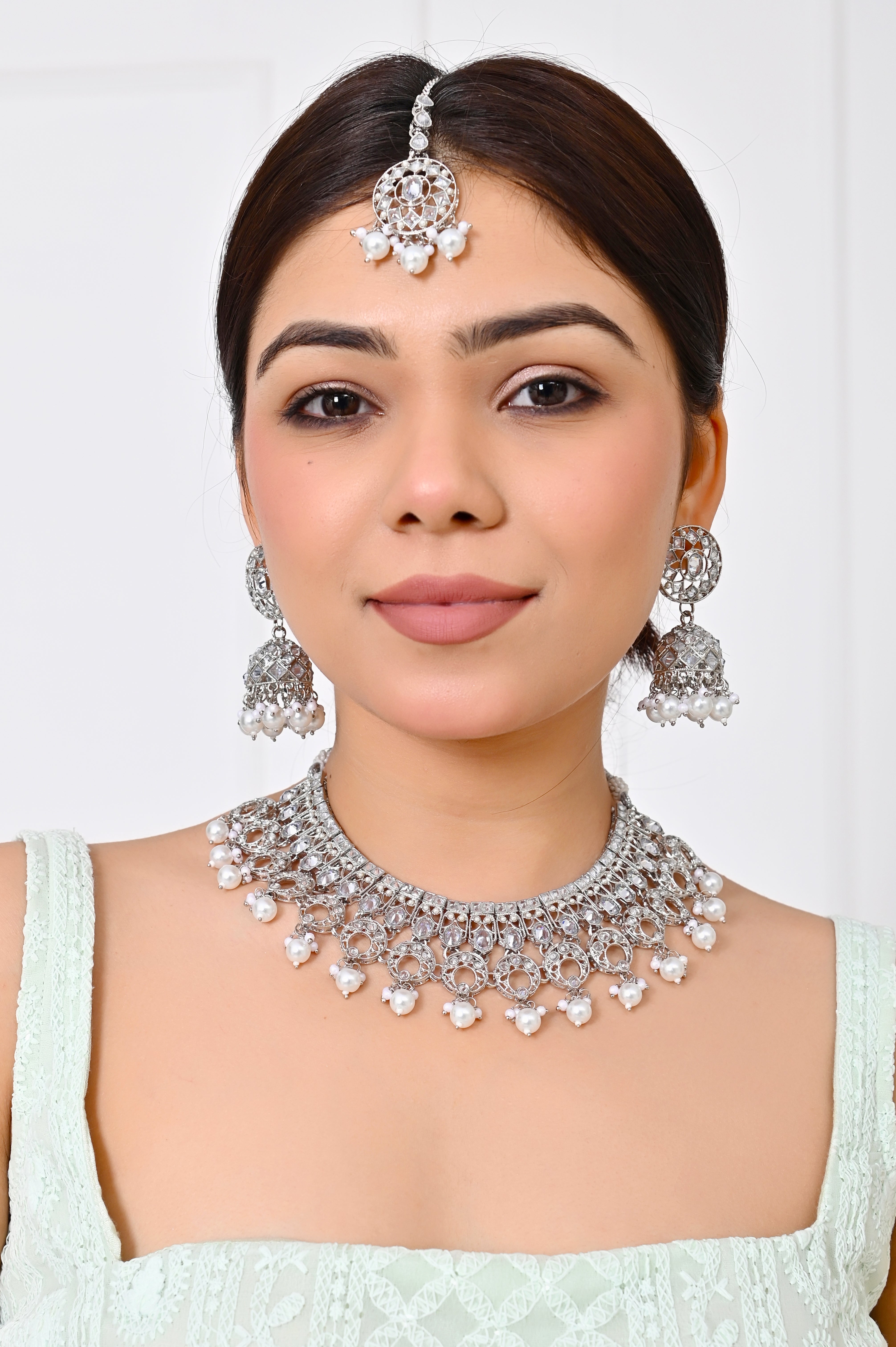 Silver Stone White Pearl Kundan Necklace with Jhumka Earrings & Maang Tikka Jewellery GetGlit