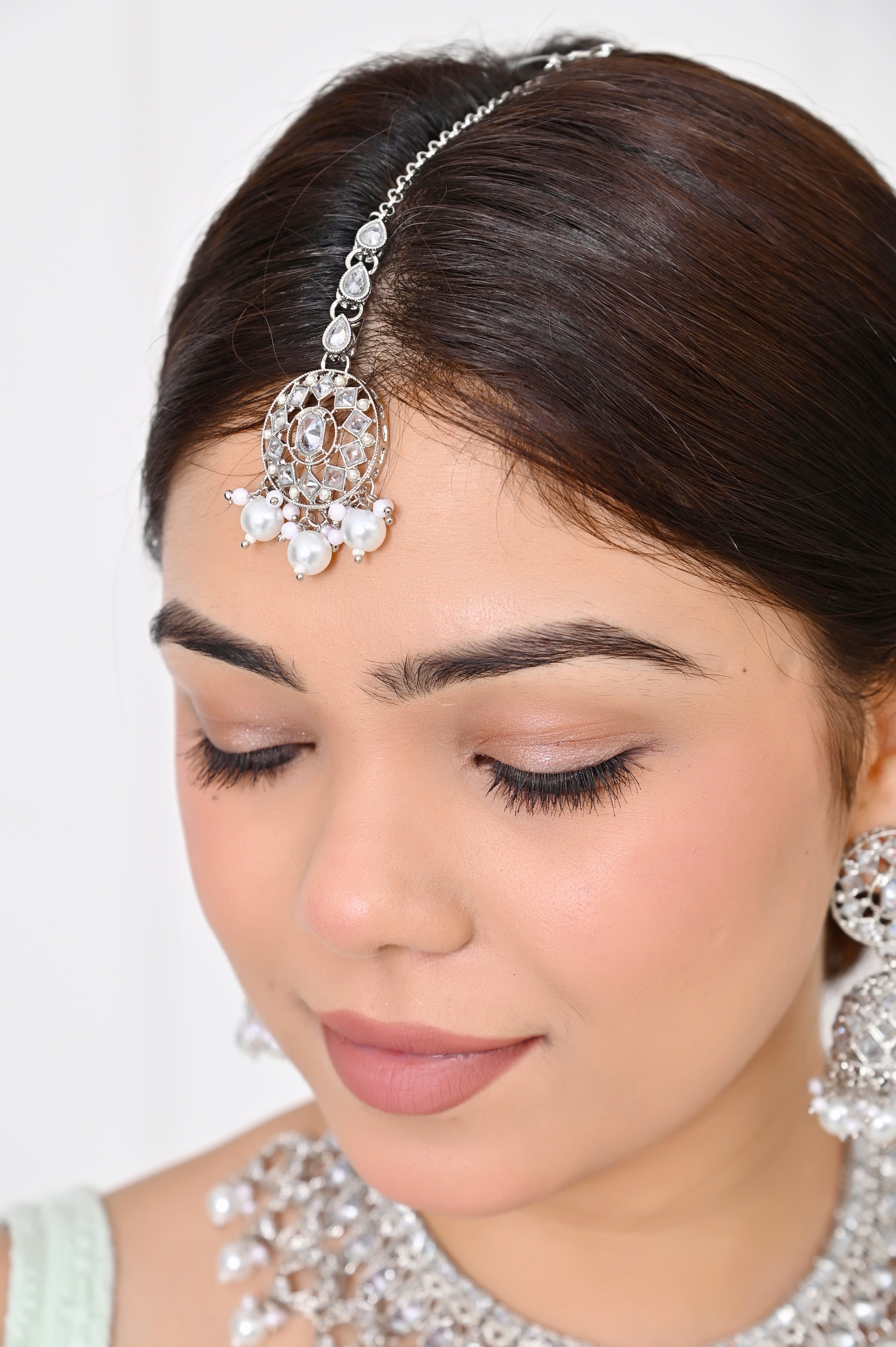 Silver Stone White Pearl Kundan Necklace with Jhumka Earrings & Maang Tikka Jewellery GetGlit