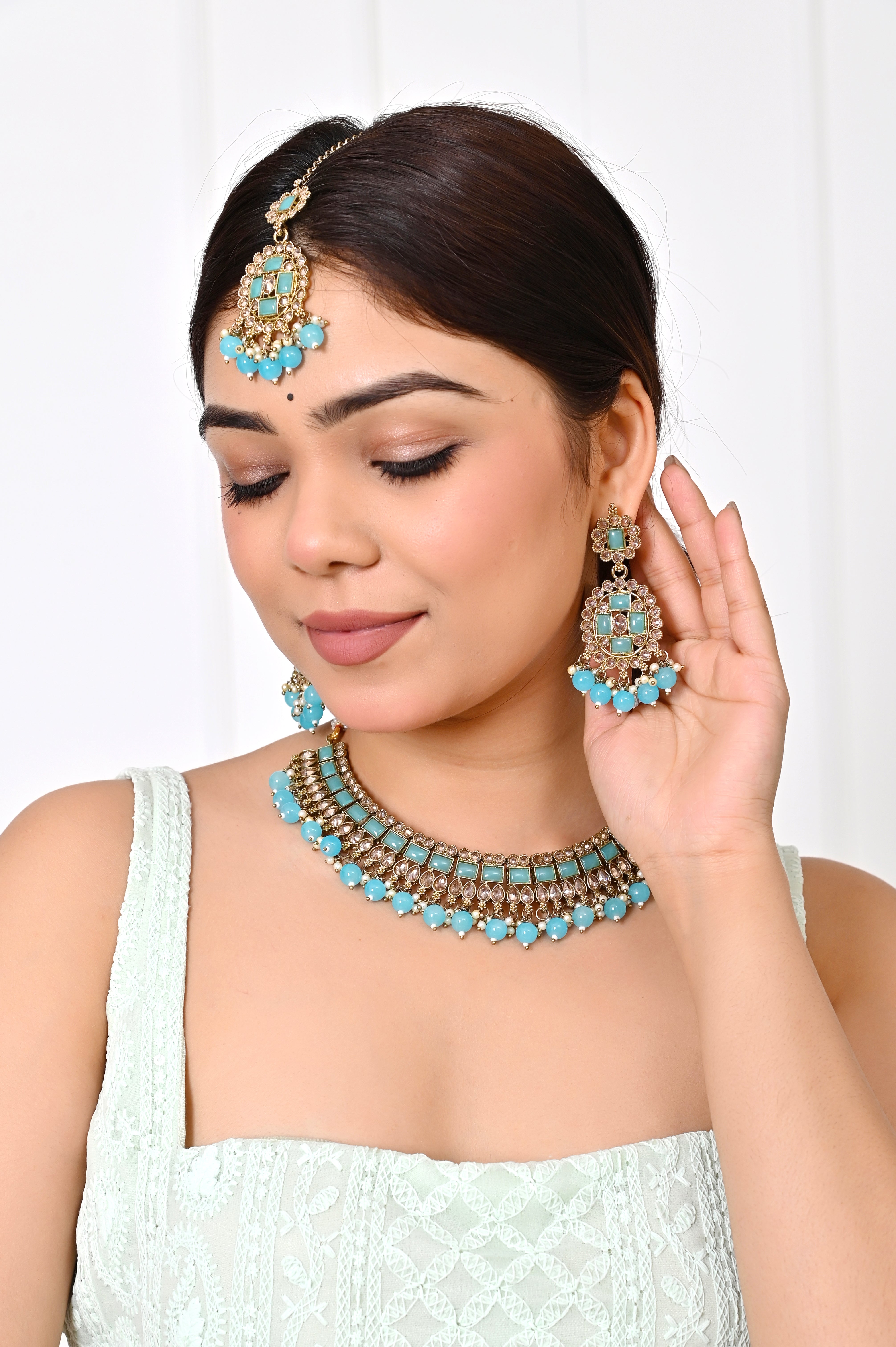 Turquoise Sky Blue Kundan Necklace Set with Chandelier Earrings and Maang Tikka Jewellery GetGlit