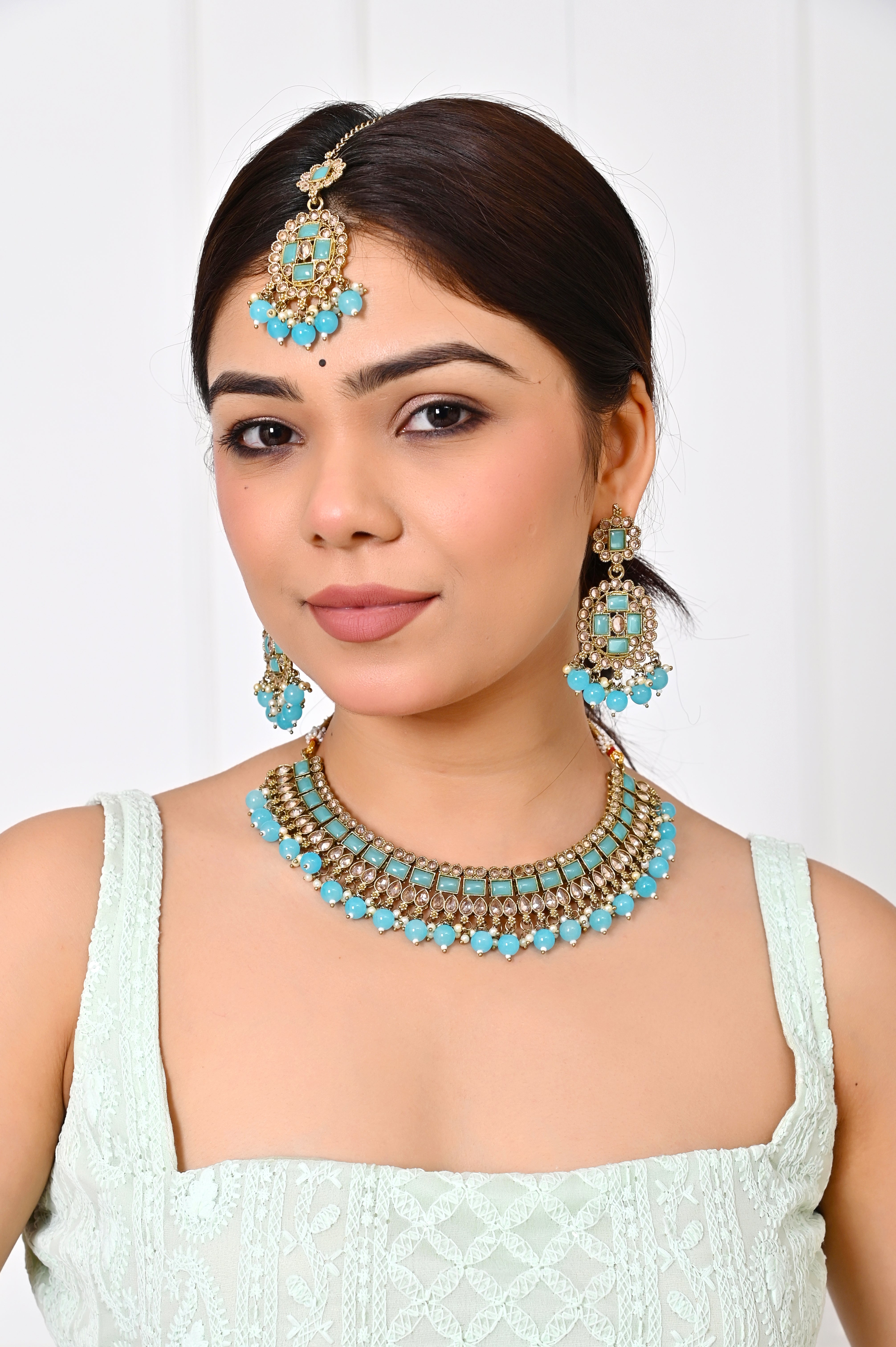 Turquoise Sky Blue Kundan Necklace Set with Chandelier Earrings and Maang Tikka Jewellery GetGlit