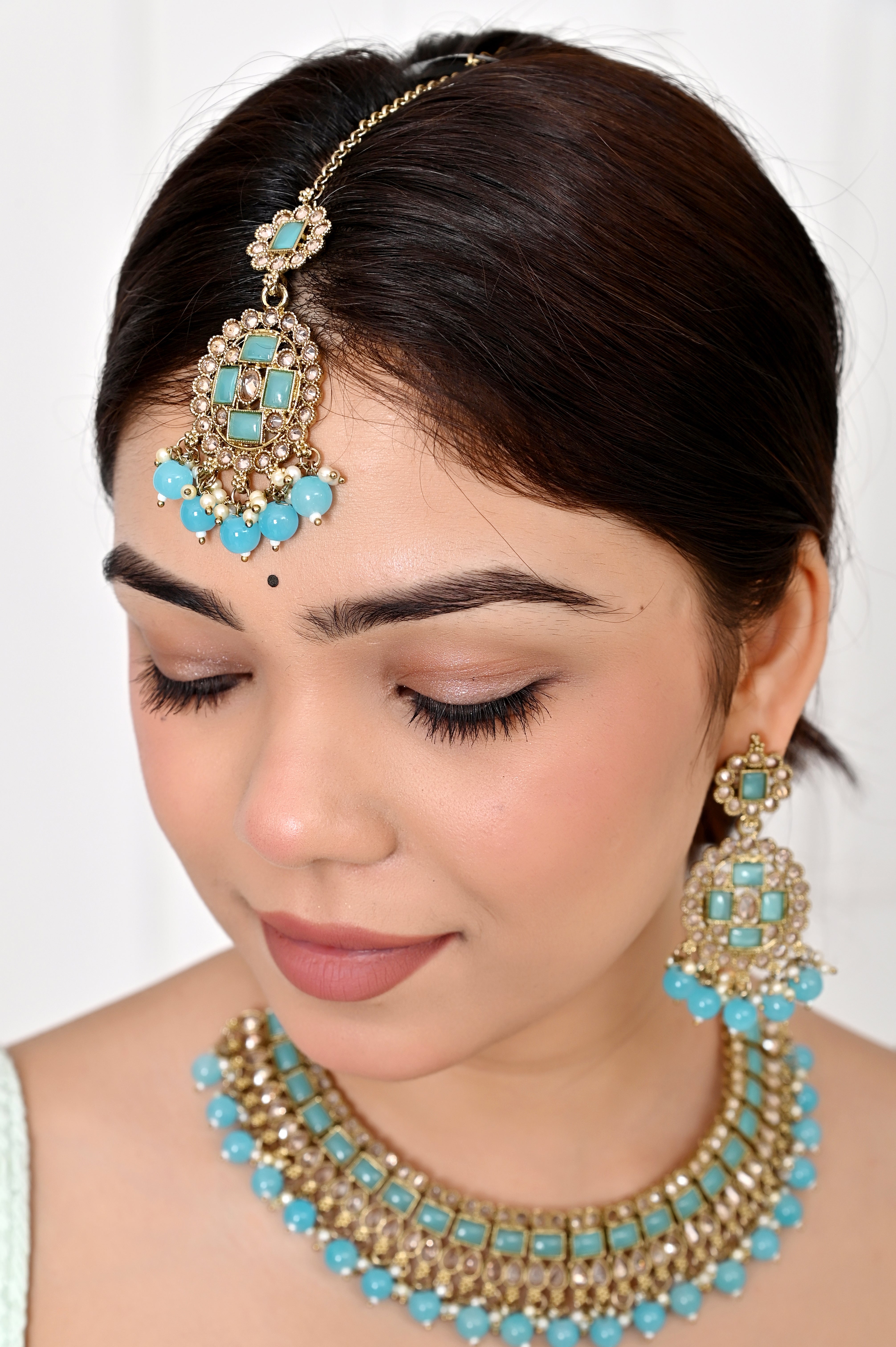 Turquoise Sky Blue Kundan Necklace Set with Chandelier Earrings and Maang Tikka Jewellery GetGlit