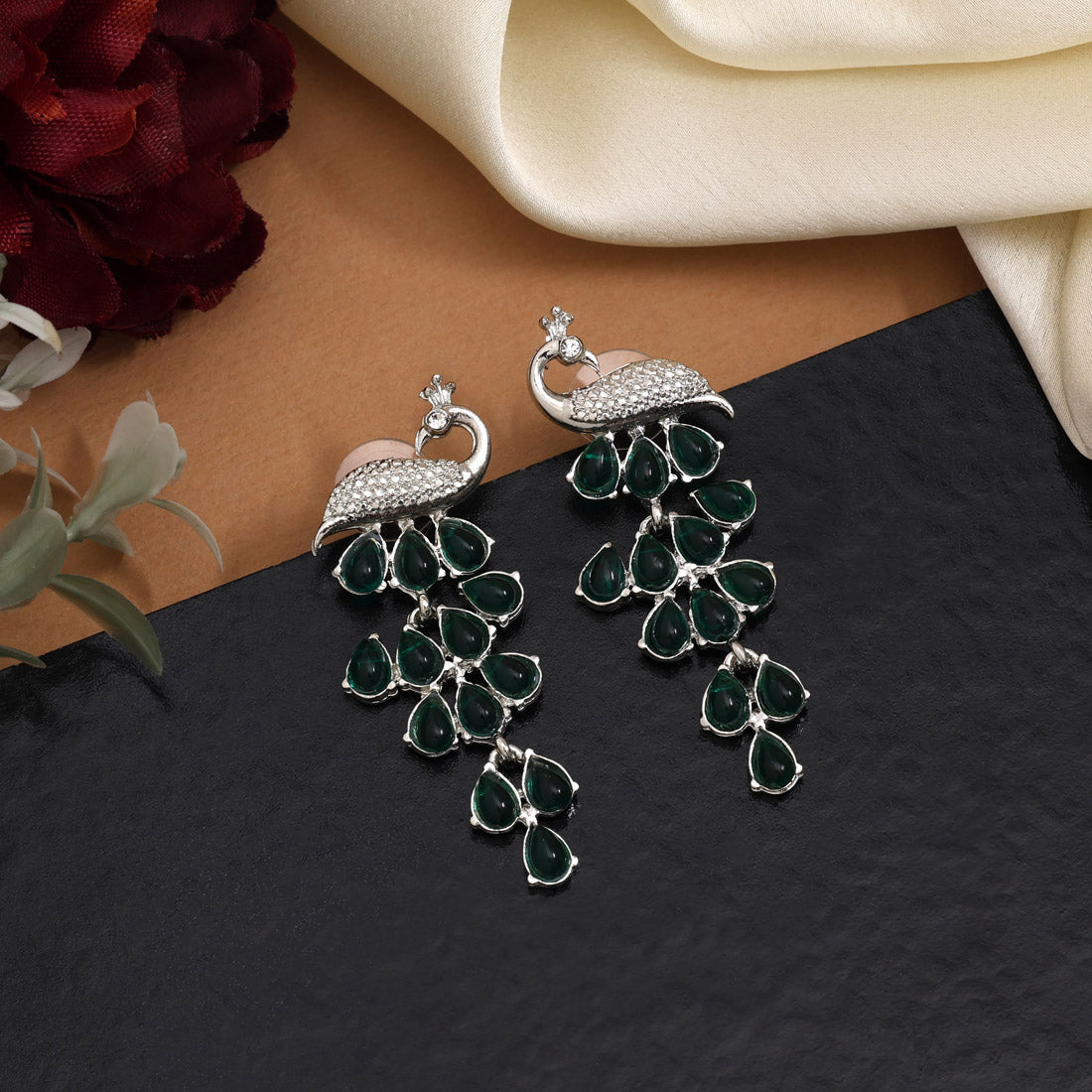 Green Color Fashion Earrings With Detailed Craftsmanship And Artistic Flair Jewellery GetGlit