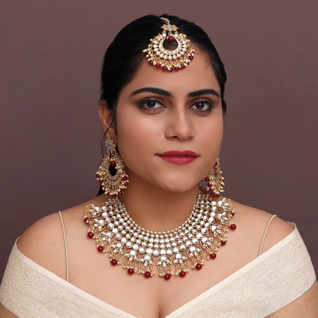 Maroon Color Imitation Pearl Kundan Necklace With Earrings & Maang Tikka For Women Jewellery GetGlit
