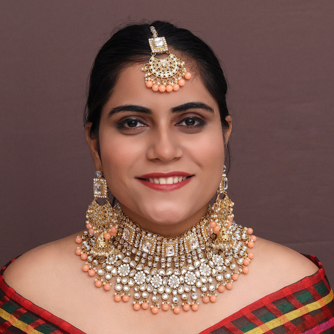 Peach Color Kundan Bridal Necklace With Earrings & Maang Tikka Jewellery GetGlit