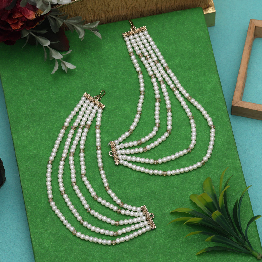 White Color Antique Earrings Chain Featuring Elegant Detailing And Fine Craftsmanship Jewellery GetGlit