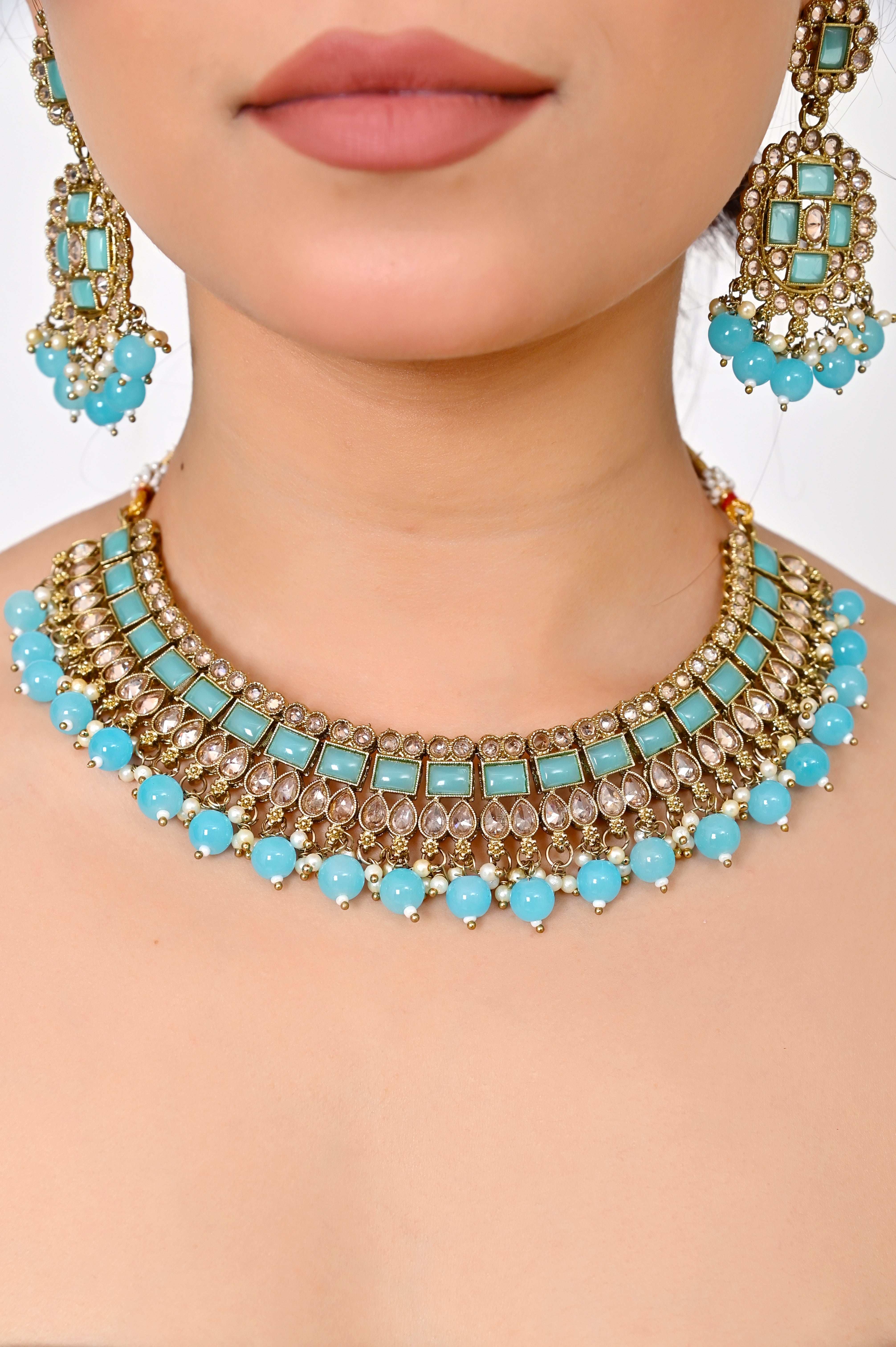 Turquoise Sky Blue Kundan Necklace Set with Chandelier Earrings and Maang Tikka Jewellery GetGlit