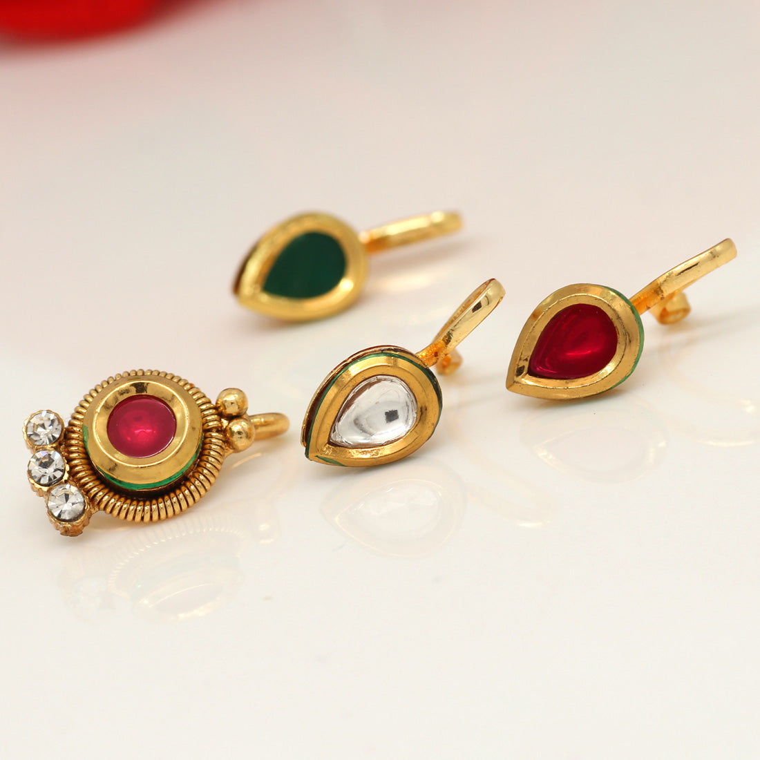 Multi Color Kundan Nose Pin Combo Of 4 Pieces (NSP180CMB)